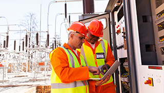 electrical engineers at an electrical substation